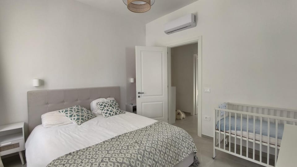 Bed, cot, air conditioner