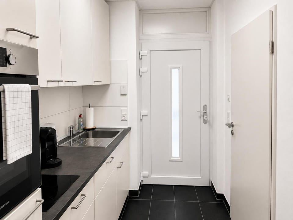 Kitchen or kitchenette, oven, stove