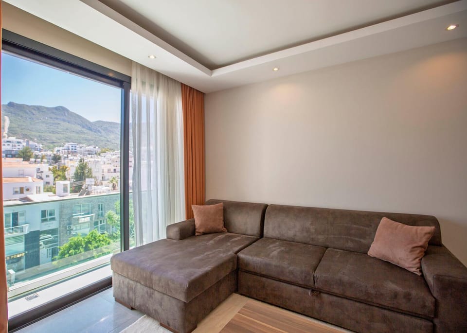 Communal lounge/ TV room, Natural landscape, Living room, Seating area, Mountain view