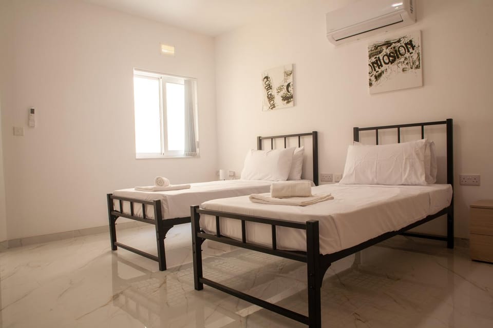 Bed, Photo of the whole room, Bedroom, towels, air conditioner