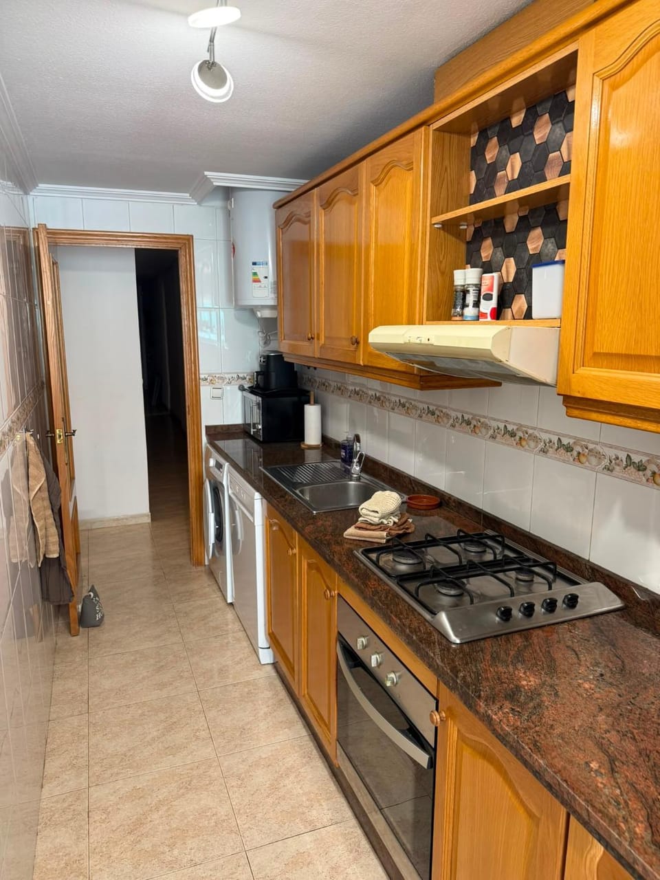 Kitchen or kitchenette, dishwasher, stove