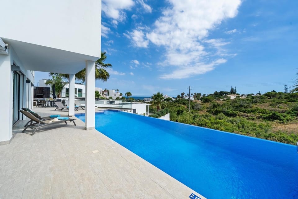 Property building, Living room, Swimming pool