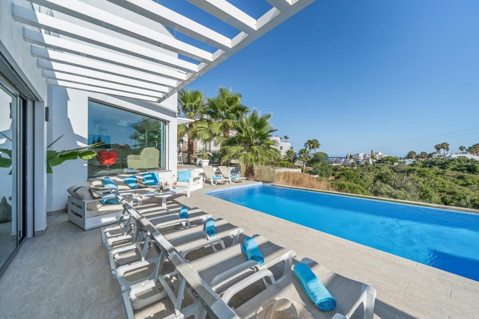 Property building, Living room, Swimming pool