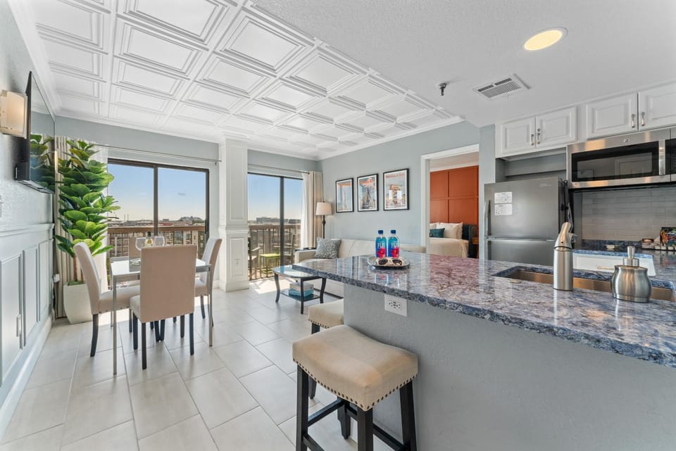 View (from property/room), Kitchen or kitchenette, Living room, Photo of the whole room, Decorative detail, Seating area, Dining area