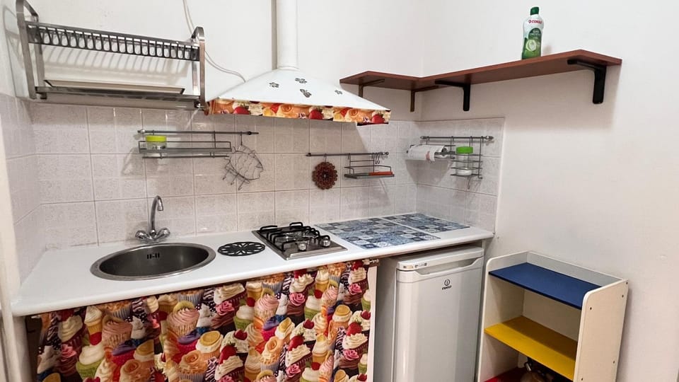 Kitchen or kitchenette, stove