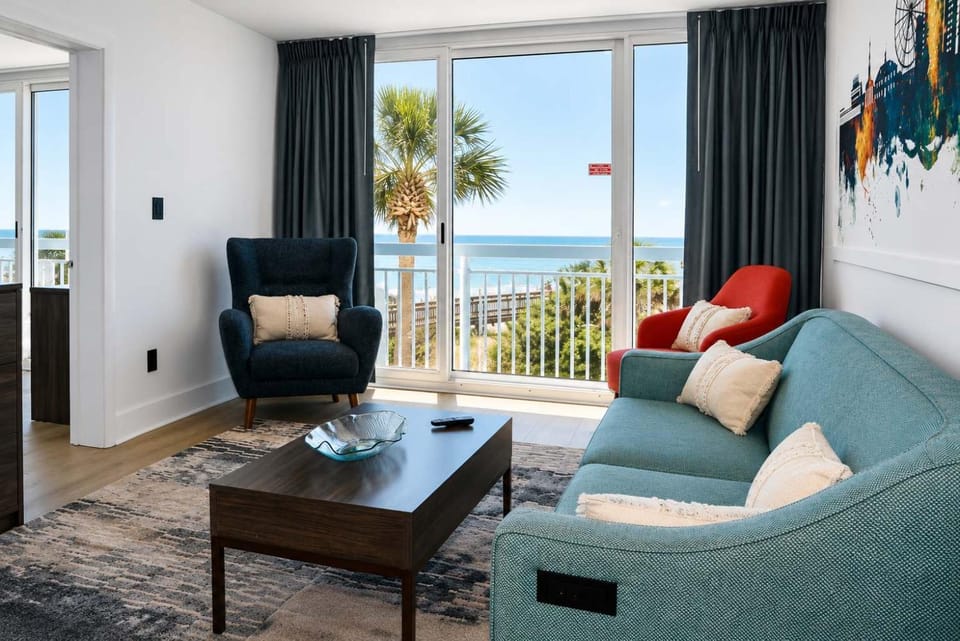 View (from property/room), Living room, Seating area, Sea view
