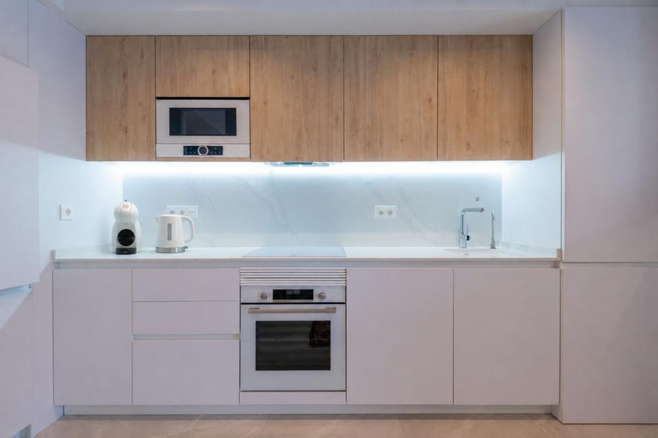 Kitchen or kitchenette, dishwasher, stove, washing machine, dryer