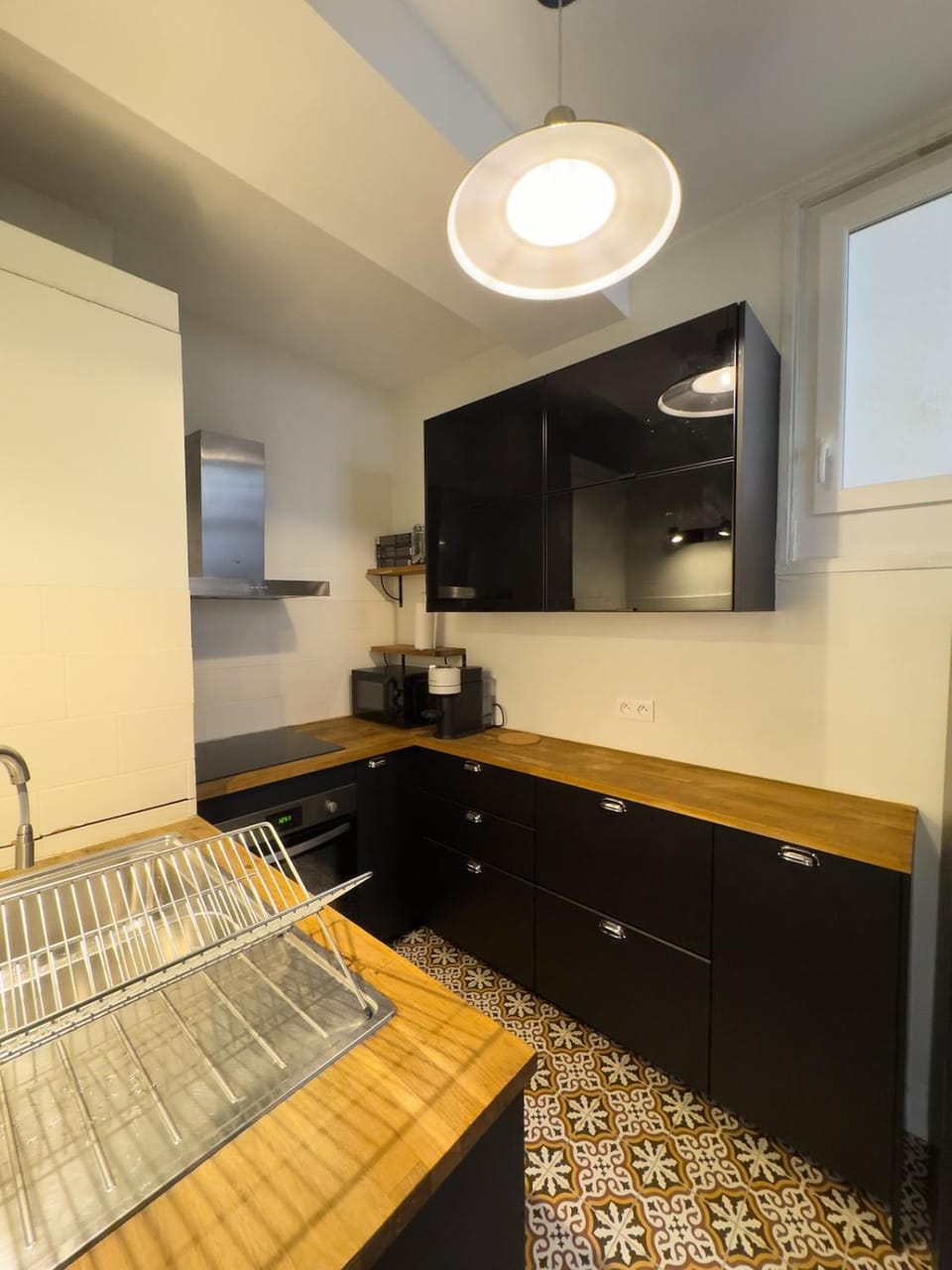 Kitchen or kitchenette, dishwasher, oven, stove