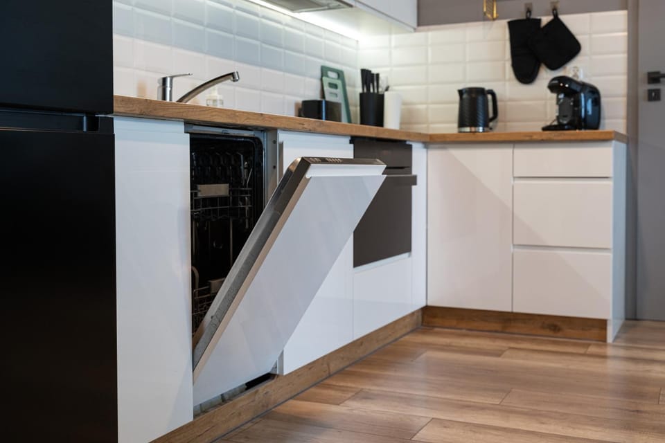 Kitchen or kitchenette, dishwasher, oven, stove, toaster