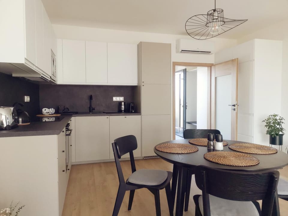 Dining area, oven, stove, kitchen, air conditioner