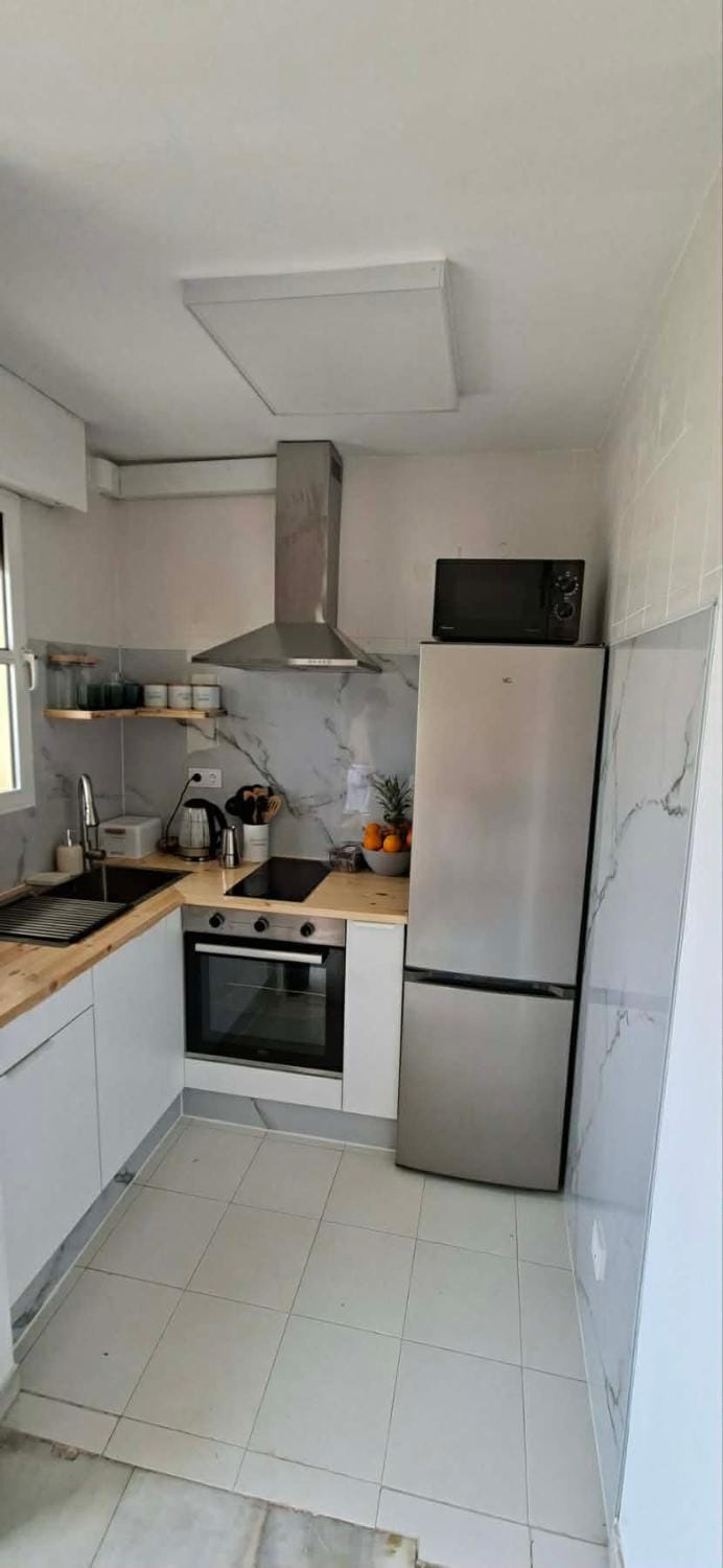 Kitchen or kitchenette, oven, stove