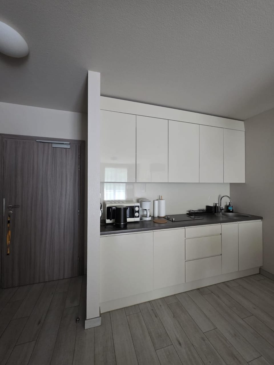 Kitchen or kitchenette, microwave, oven, stove, kitchen