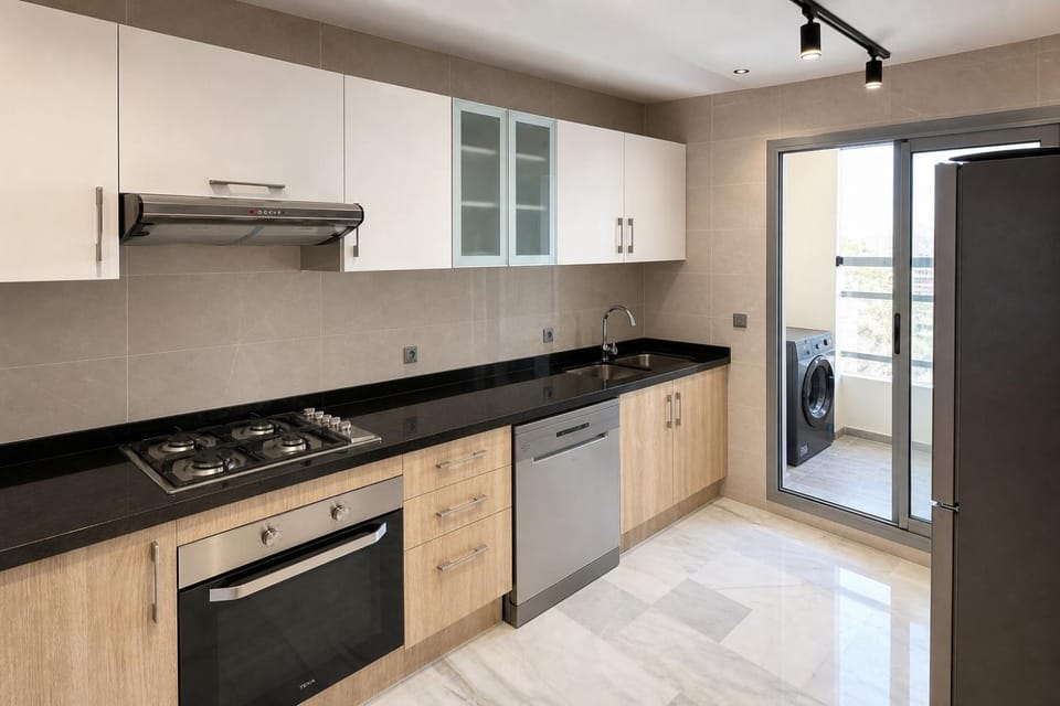 Kitchen or kitchenette, dishwasher, oven, stove