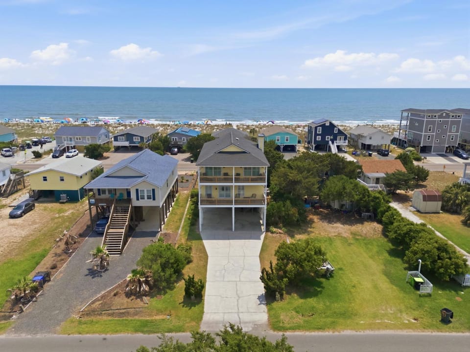Steps from Beach with Ocean Views and Fresh Updates House in Oak Island