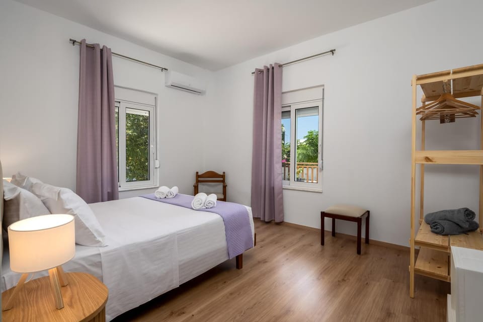 Bed, Bedroom, towels, wardrobe, air conditioner