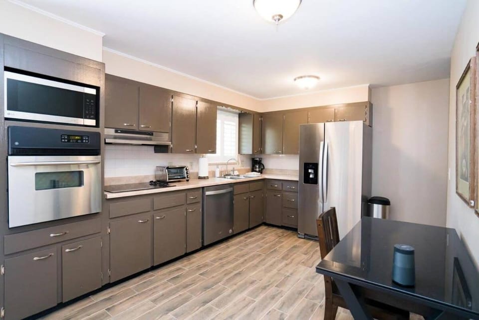 Kitchen or kitchenette, dishwasher, oven, stove, toaster