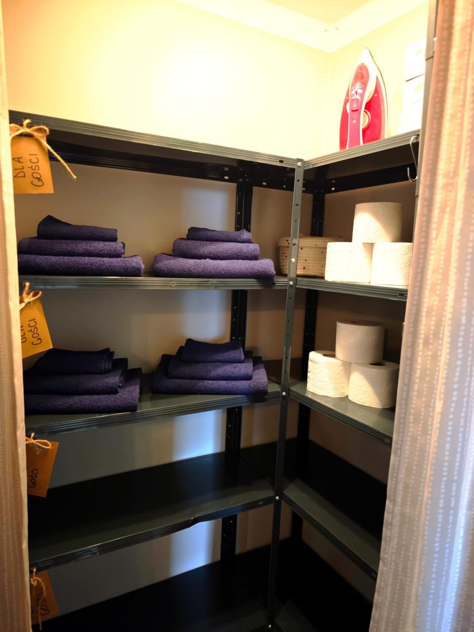 flat iron, towels, wardrobe
