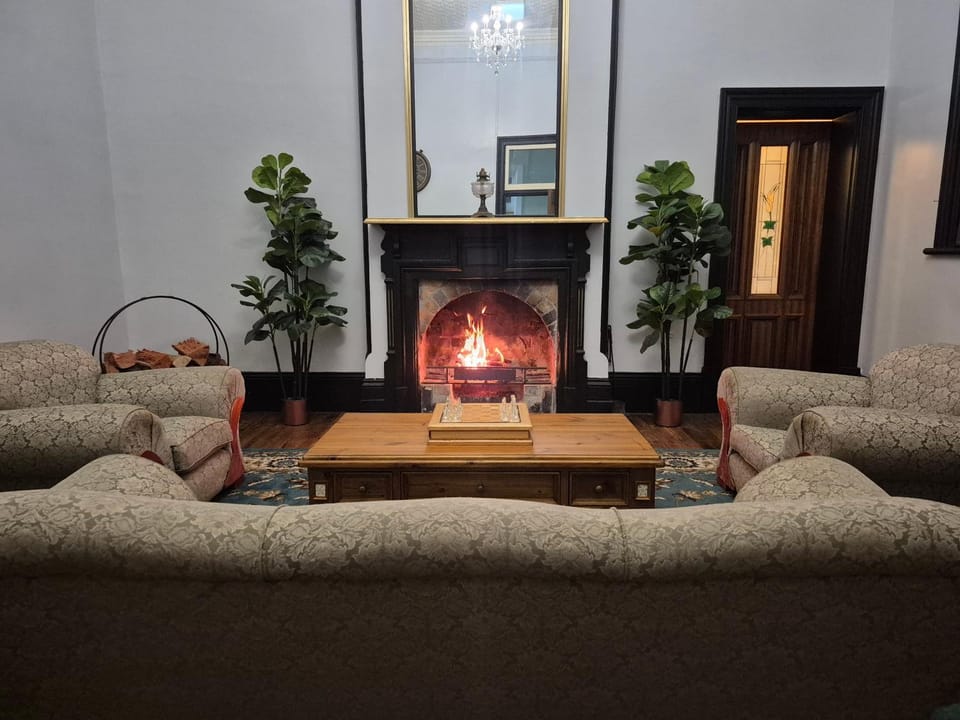Communal lounge/ TV room, fireplace