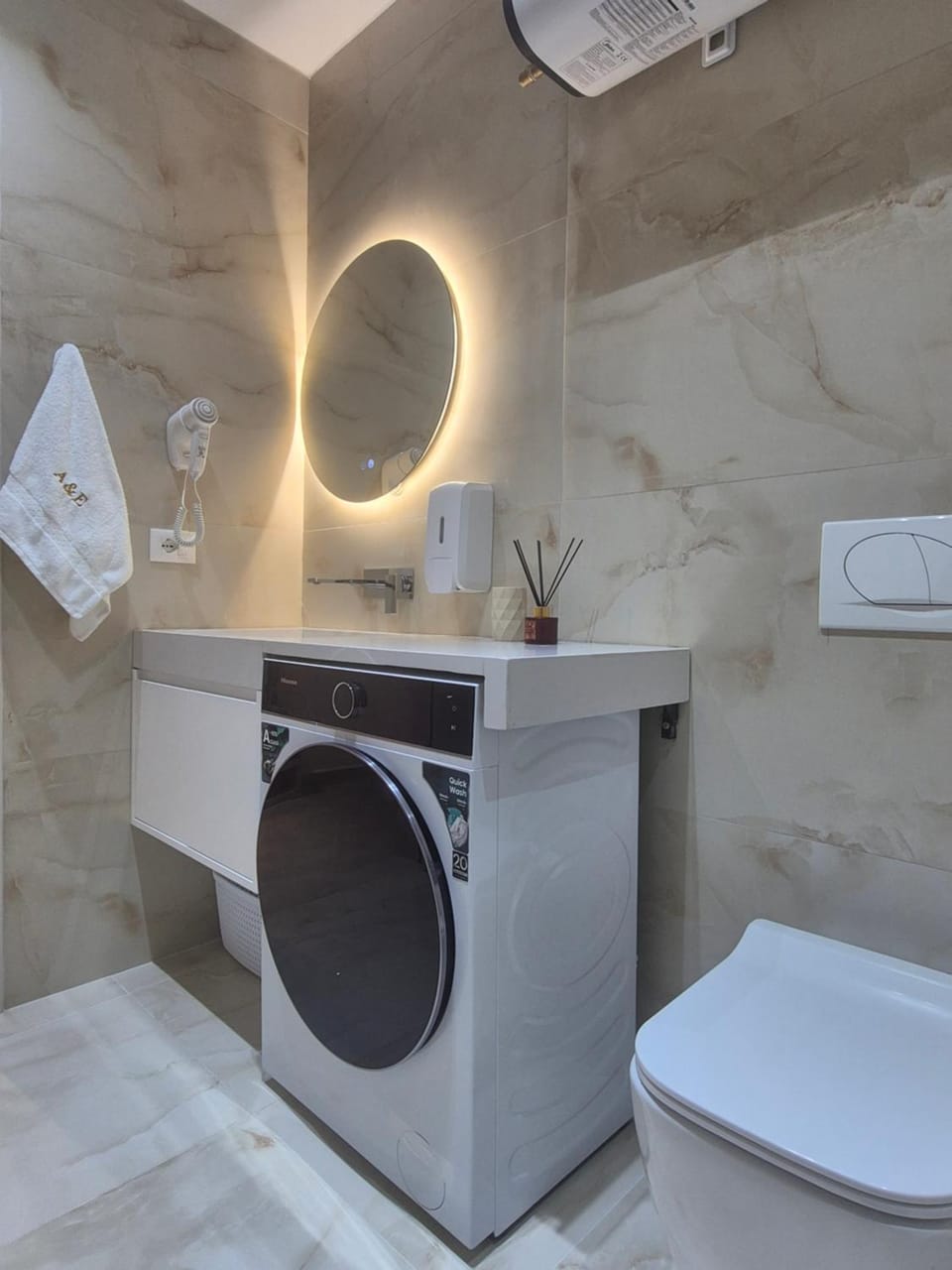 Bathroom, towels, washing machine, dryer