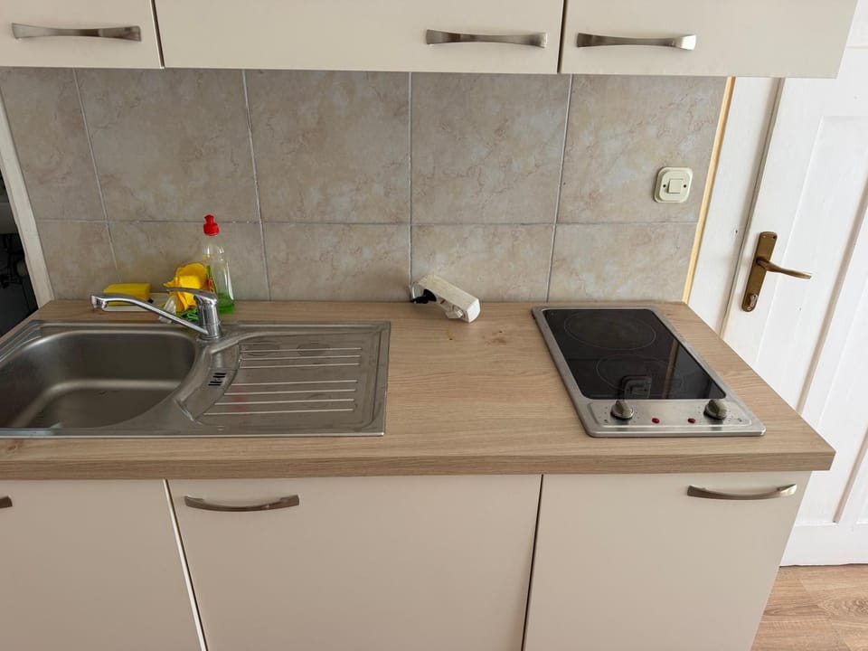 Kitchen or kitchenette, stove, kitchen