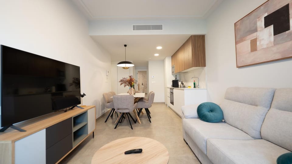 TV and multimedia, Kitchen or kitchenette, Living room, Seating area, Dining area, air conditioner