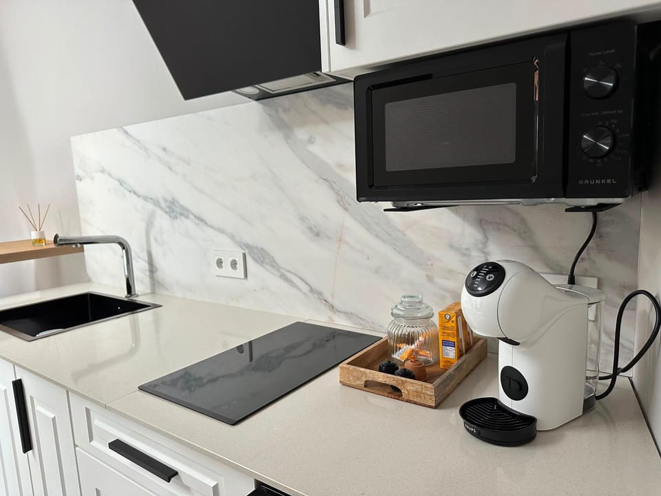 Kitchen or kitchenette, stove, kitchen