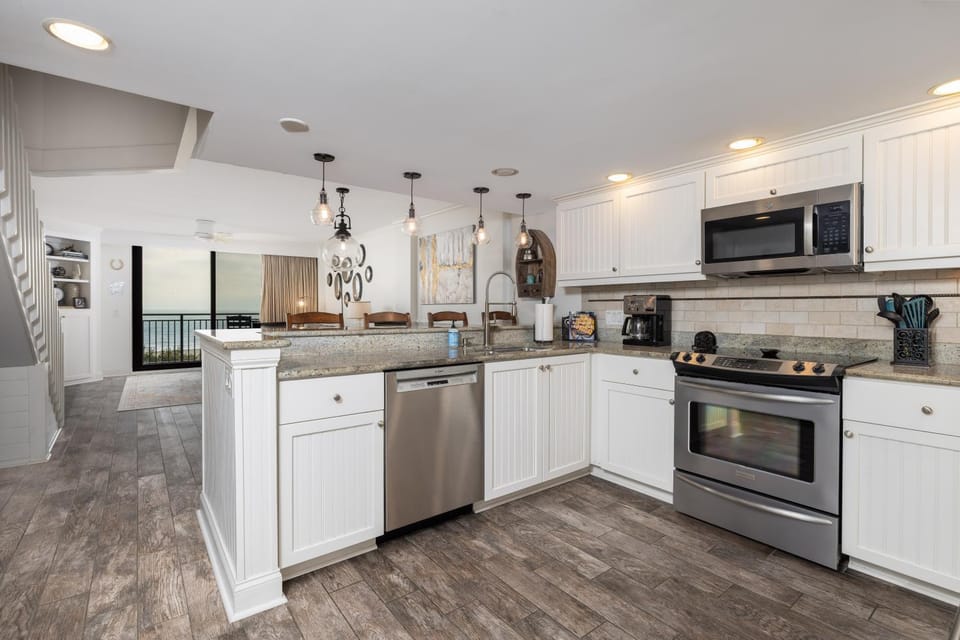 Kitchen or kitchenette, Dining area, furniture, microwave, oven, stove