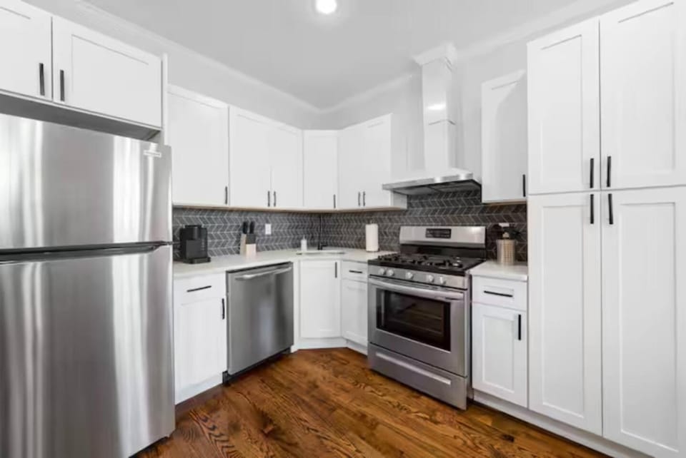 Kitchen or kitchenette, dishwasher, oven, stove, toaster