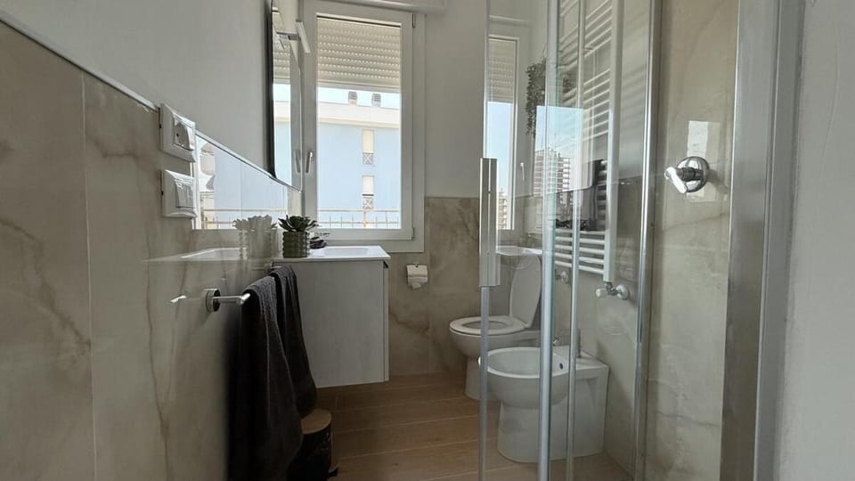 Noir & Salt Your Seaside Escape Apartment in Lido di Jesolo