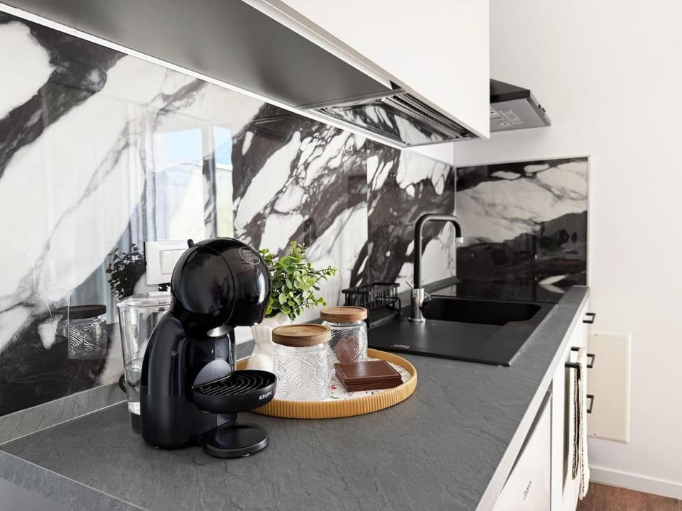 Noir & Salt Your Seaside Escape Apartment in Lido di Jesolo