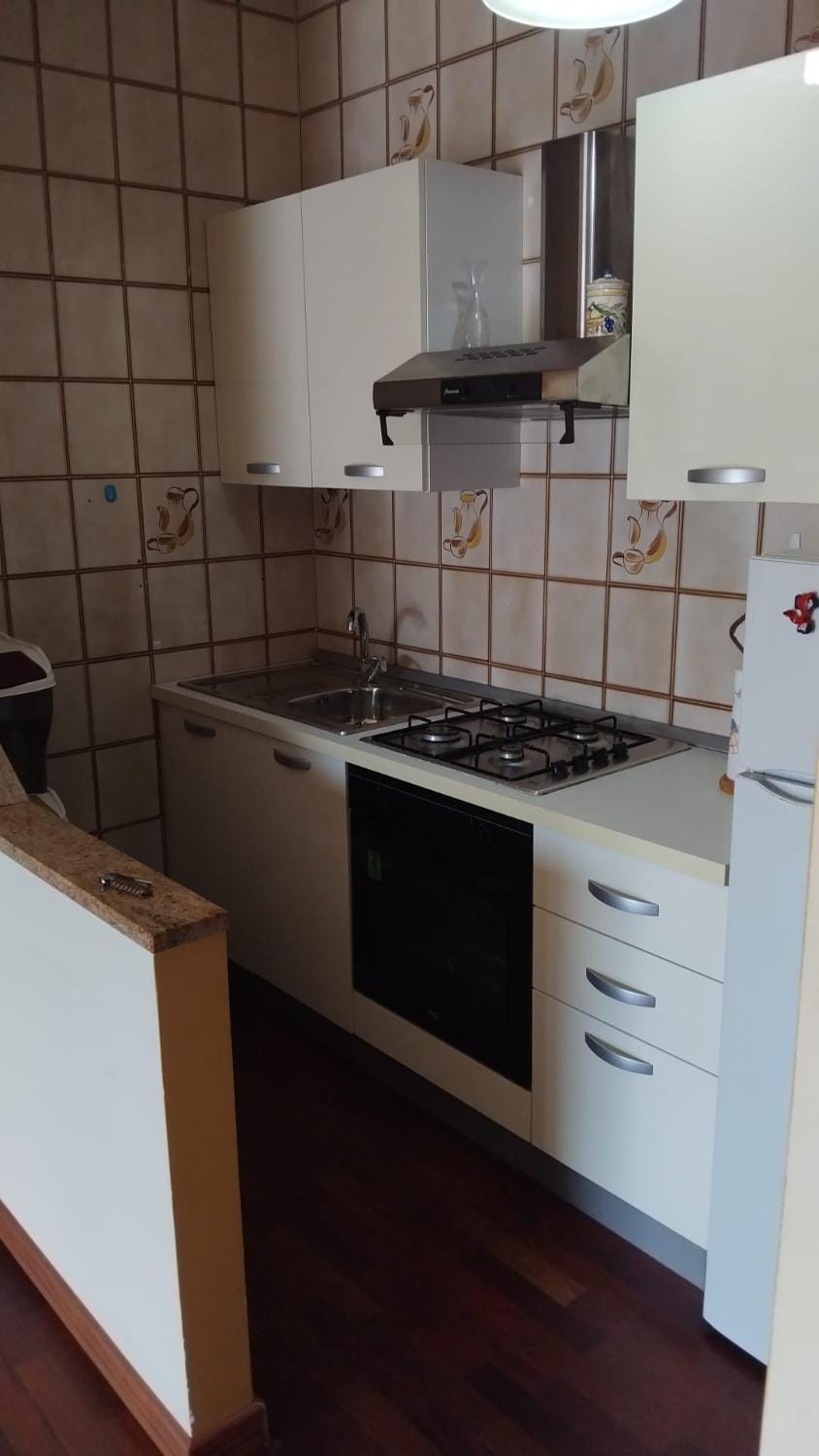 Kitchen or kitchenette, stove