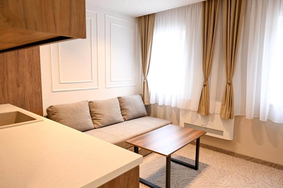 Bed, Living room, Seating area, Bedroom