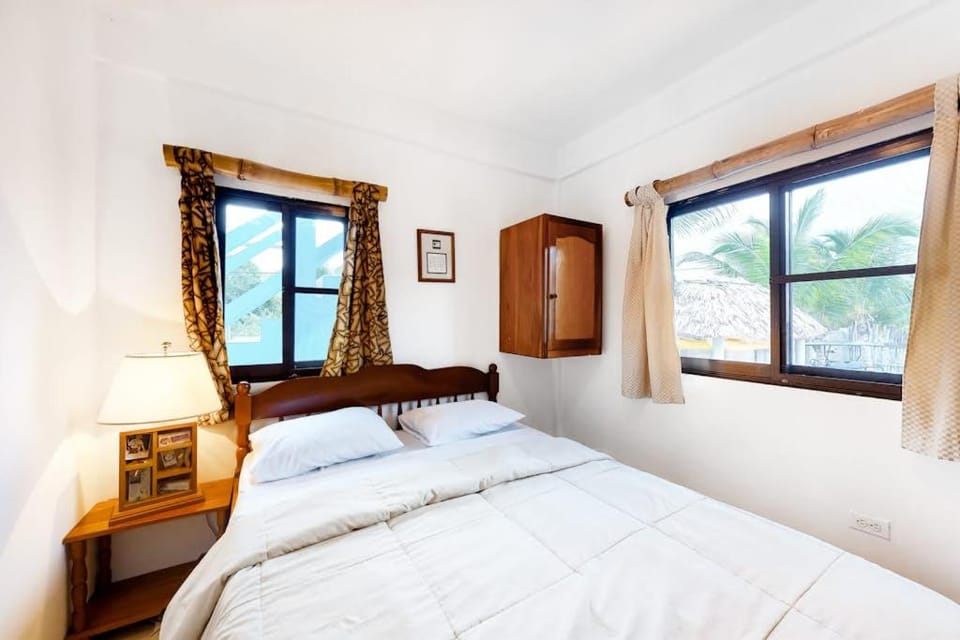 Affordable Suite on Gated Property with Rooftop Deck WiFi AC and Shared Pool Apartment in Belize District
