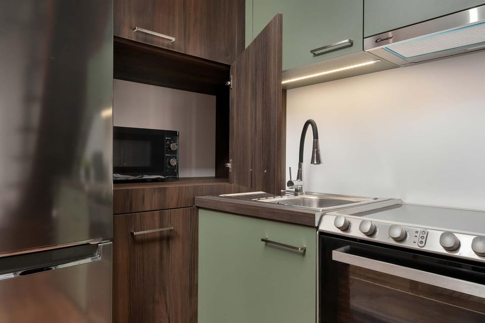 Kitchen or kitchenette, oven, stove