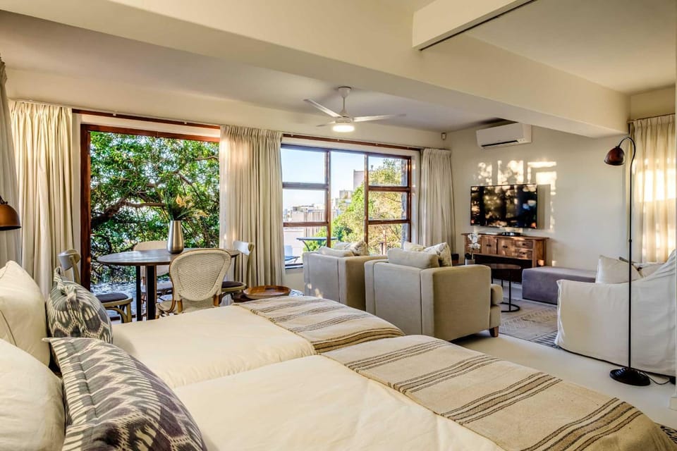 Bed, Living room, Seating area, Bedroom