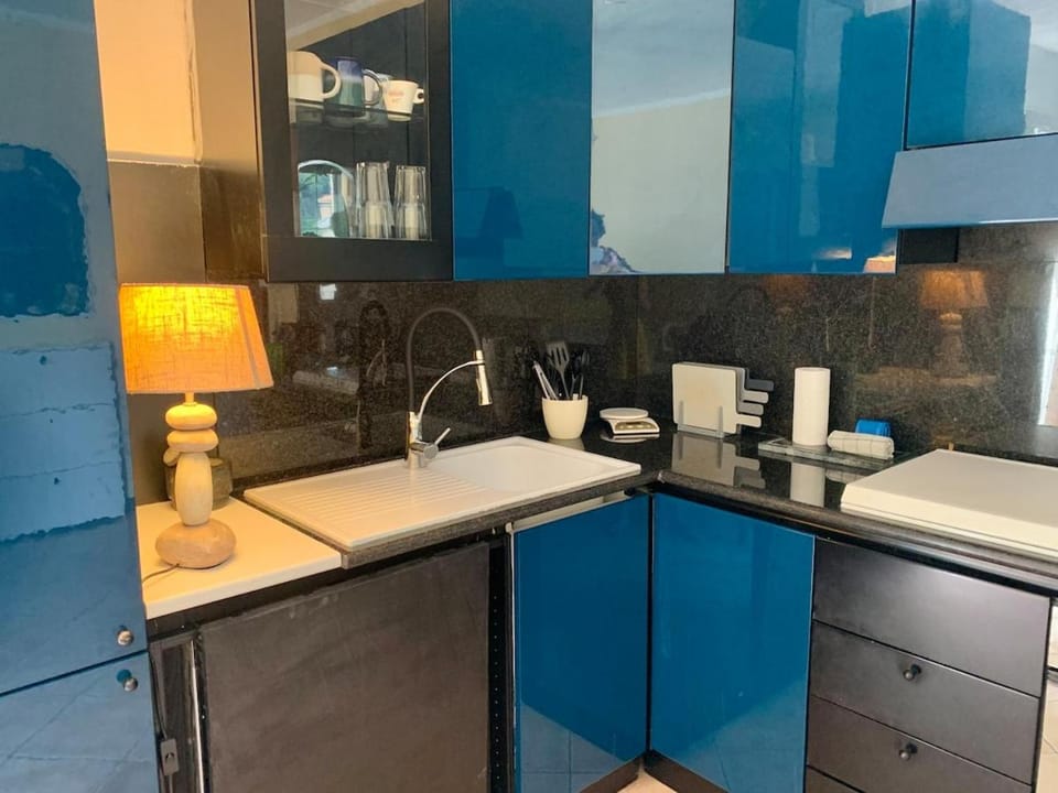 Kitchen or kitchenette, stove