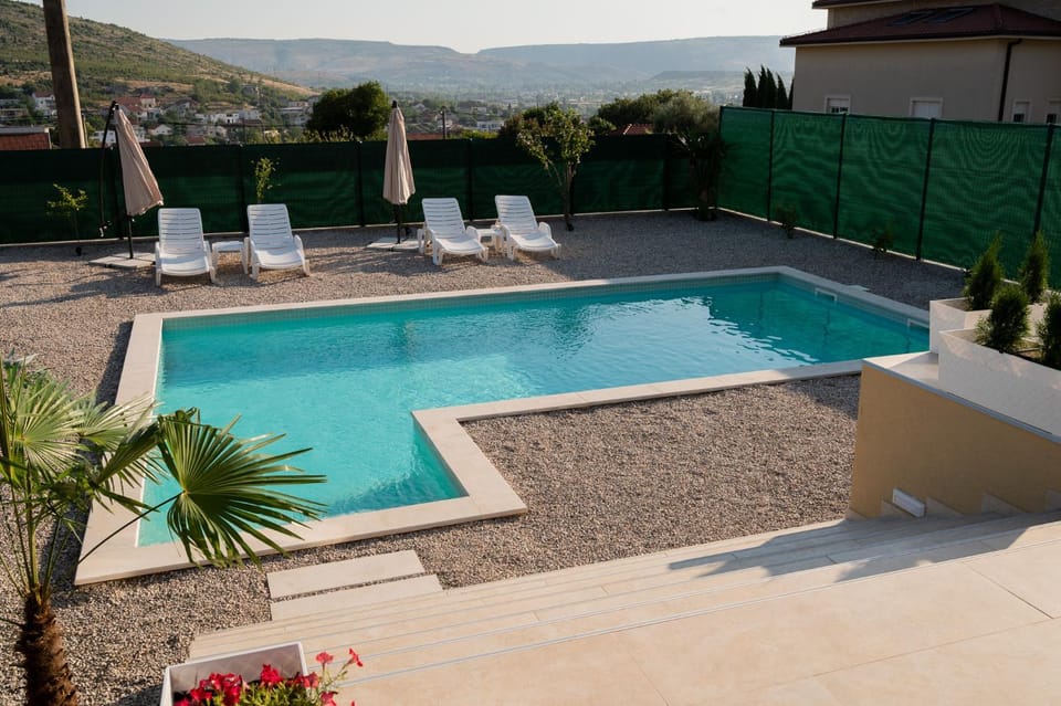 Patio, Day, Natural landscape, Mountain view, Pool view, Swimming pool, Swimming pool, sunbed