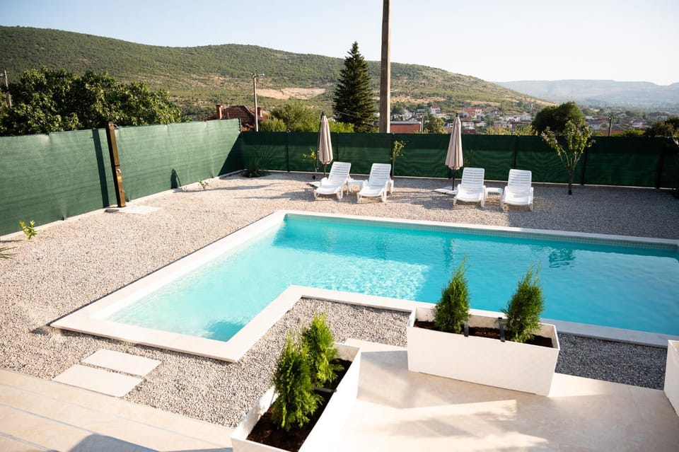 Patio, Day, Natural landscape, Mountain view, Pool view, Swimming pool, Swimming pool, sunbed