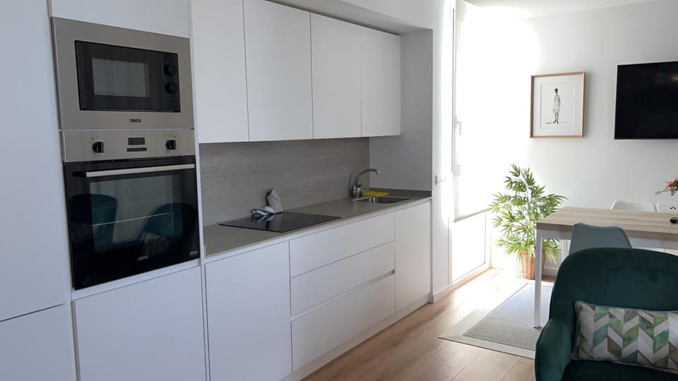 Kitchen or kitchenette, oven, stove