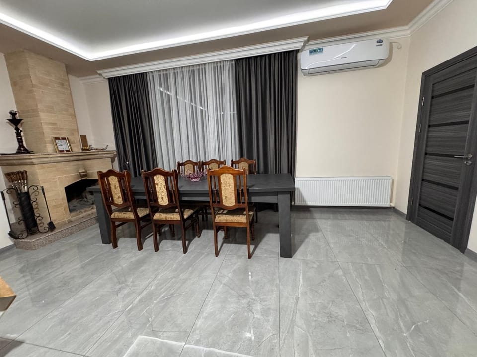 Living room, Seating area, Dining area, fireplace, fireplace, internet, air conditioner