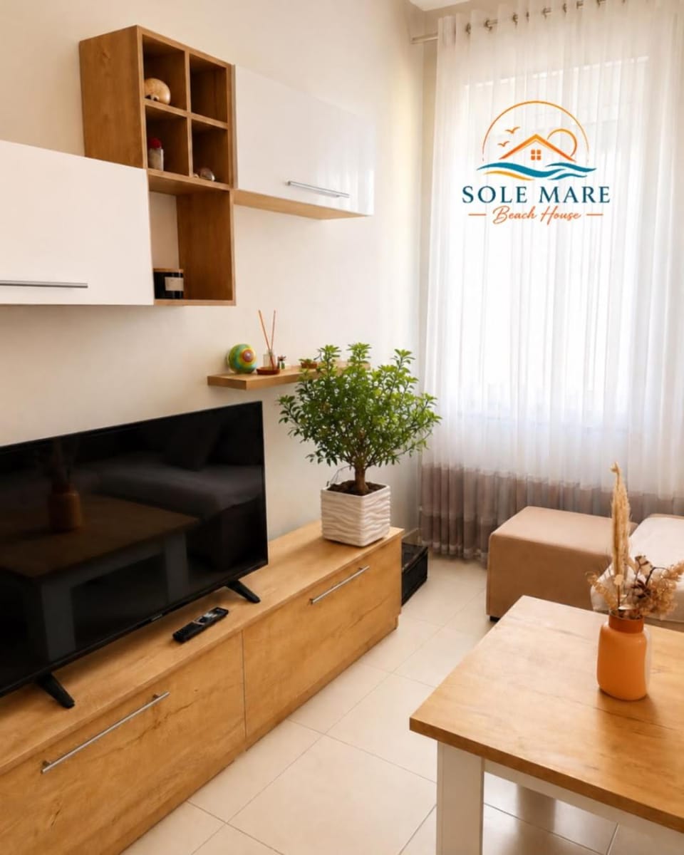 TV and multimedia, Living room, Seating area, Text overlay