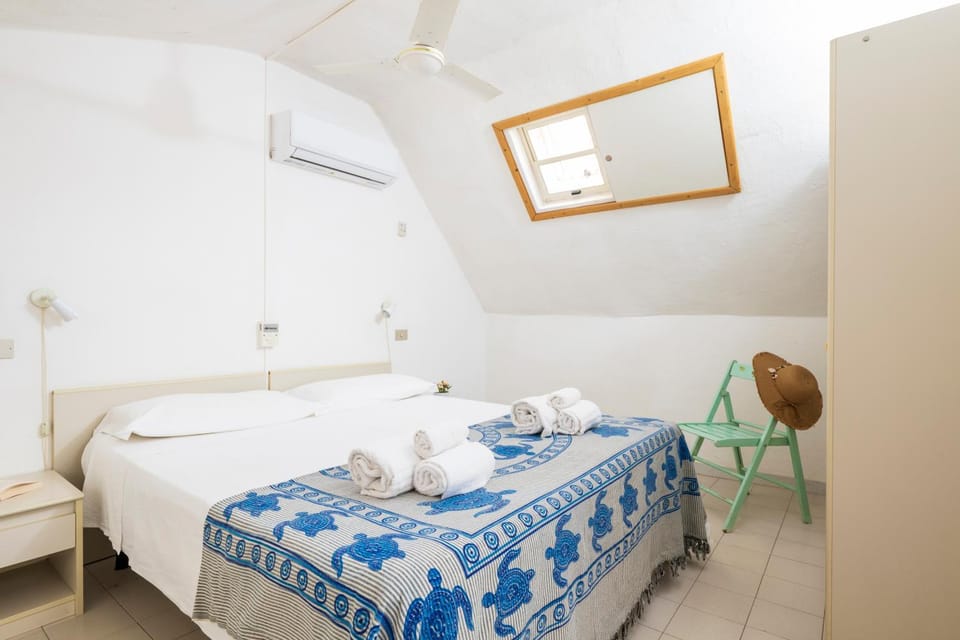 Bed, Bedroom, towels, wardrobe, air conditioner