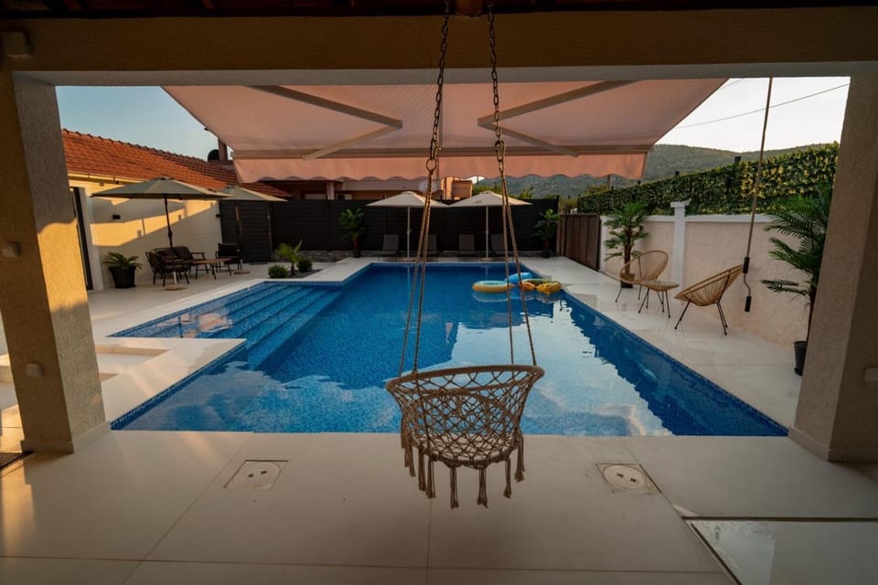 Patio, Day, Pool view, Swimming pool, sunbed
