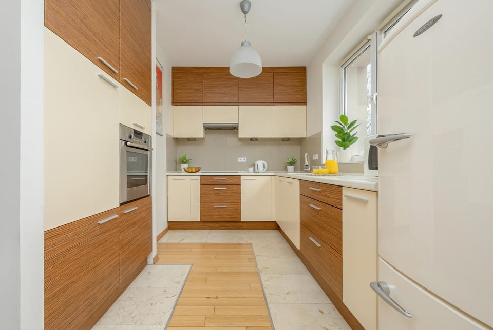 Kitchen or kitchenette, dishwasher, oven, stove
