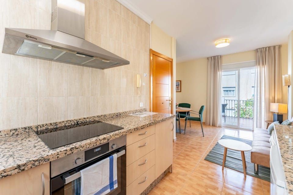 Kitchen or kitchenette, Dining area, dishwasher, stove, air conditioner