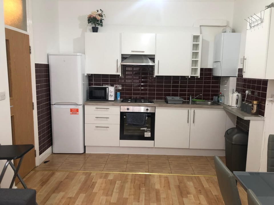 Kitchen or kitchenette, oven, toaster