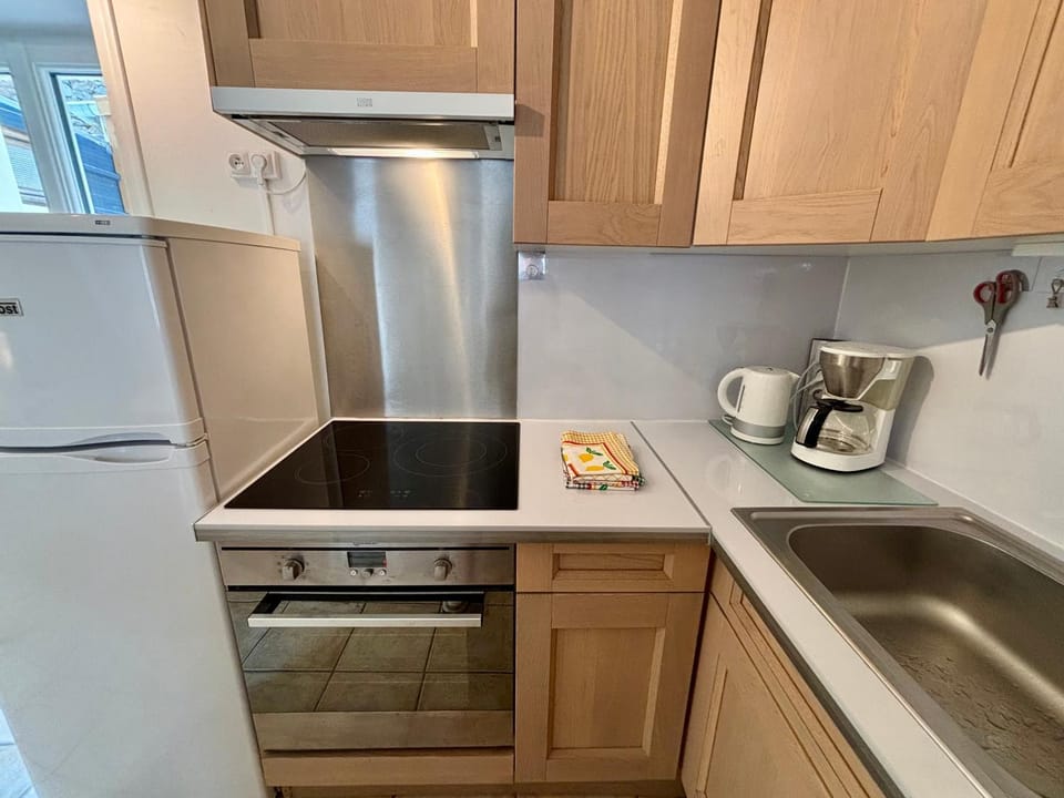 Kitchen or kitchenette, stove