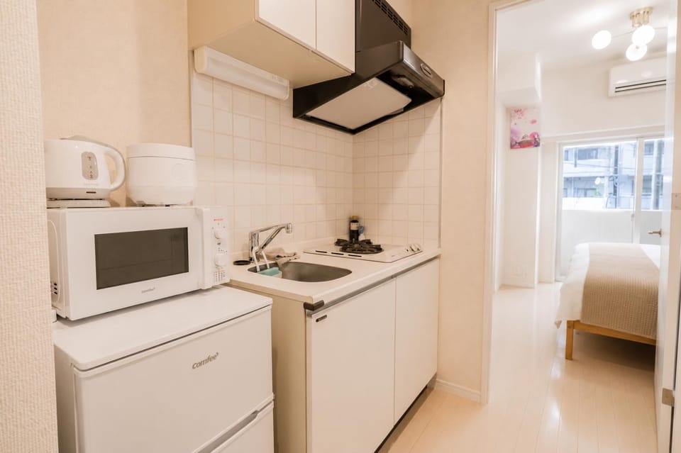 Kitchen or kitchenette, Photo of the whole room, Bedroom, stove