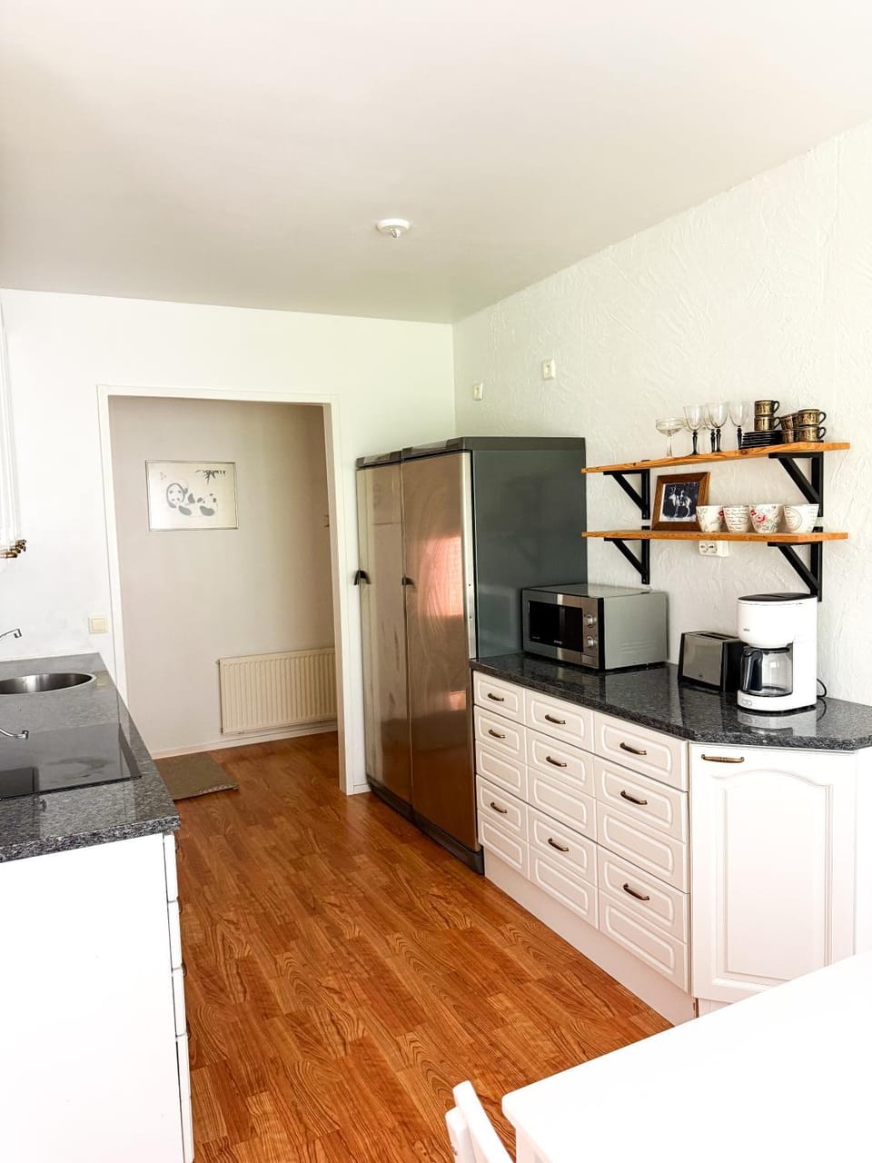 Kitchen or kitchenette, dishwasher, oven, stove, toaster