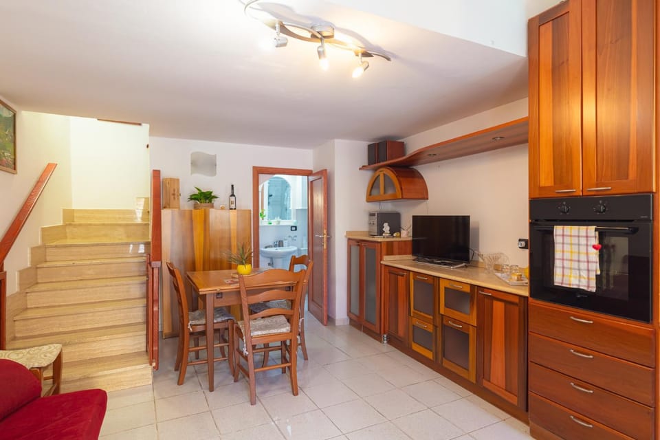 Kitchen or kitchenette, stove